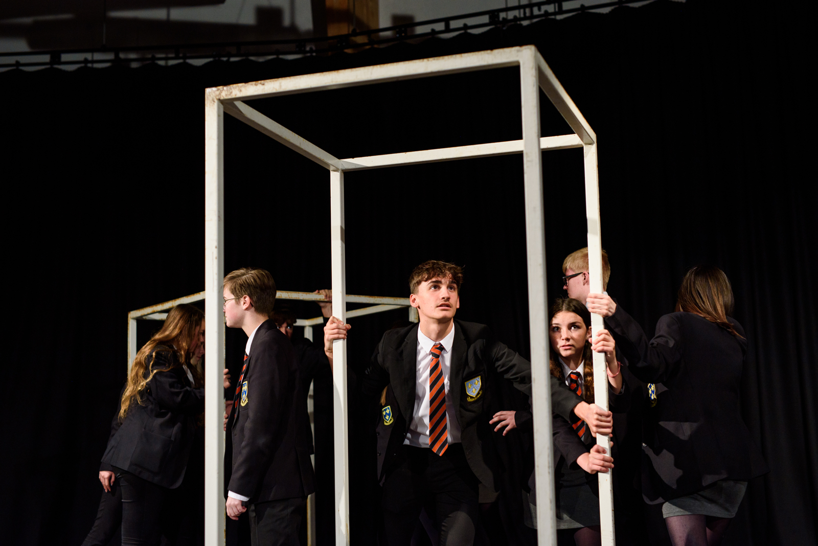 students performing in drama.